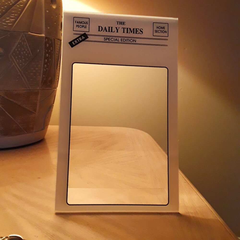 Retro Daily Times picture frame, plastic